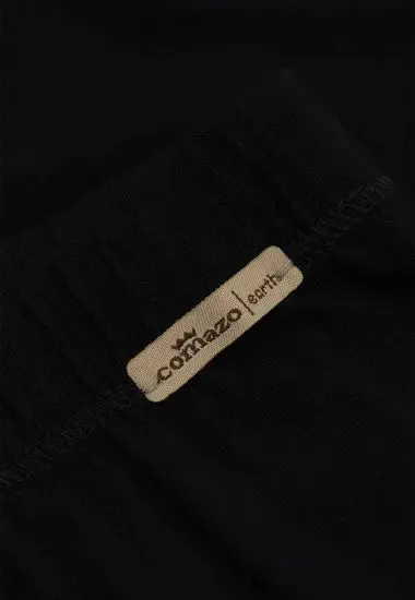 Black organic cotton leggings by Comazo